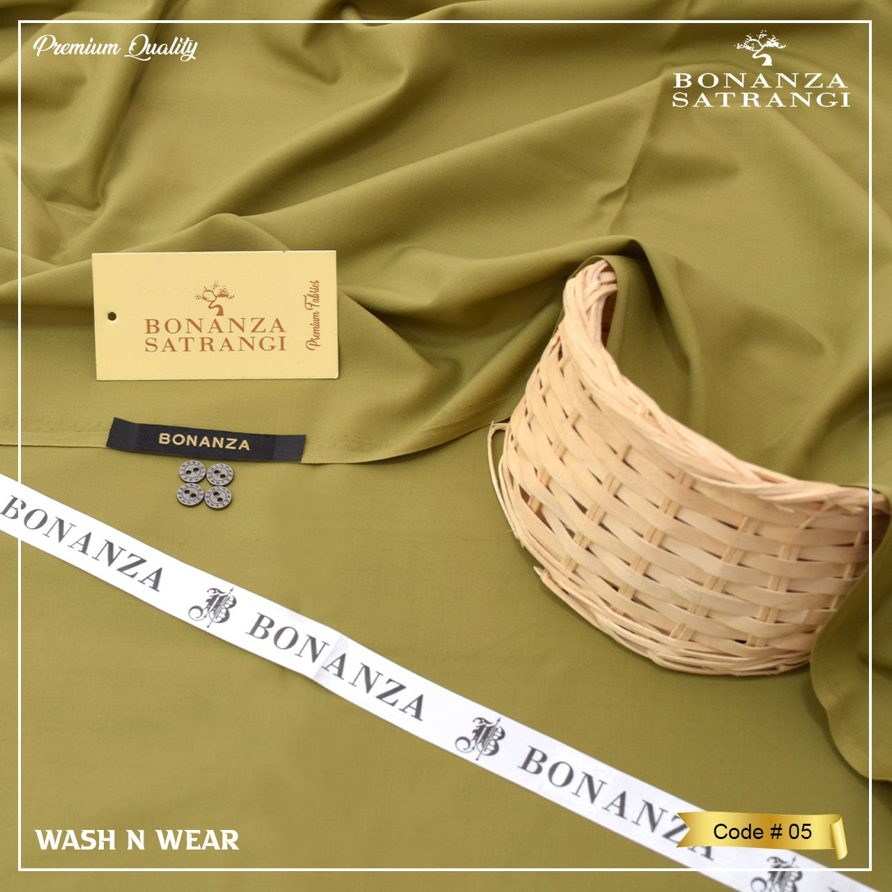 Green fabric with Bonanza Satrangi branding, including a tag, woven basket, and measuring tape.